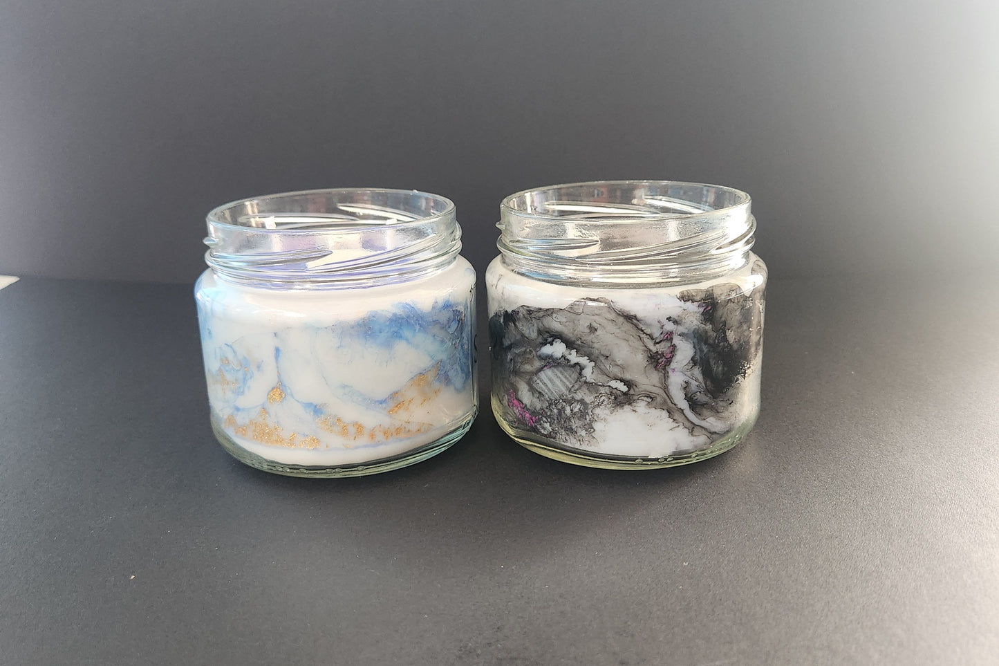 The Candle Shelf. Handmade Custom Bookish Soy Wax Candles inspired by those unforgettable moments between the pages. Beautifully marbled glass container jar candles. Shadow Daddy, Star Dust, The Last Page. Pillar candles. Book candle. Heats candle. Forest, floral and leaves candle. Their fancy and deliciously scented. The perfect decor item for your home, office, wedding or even as a gift. We offer customised labels and candle colours. Each candle is made to order.  All candles are made from NZ sourced wax.