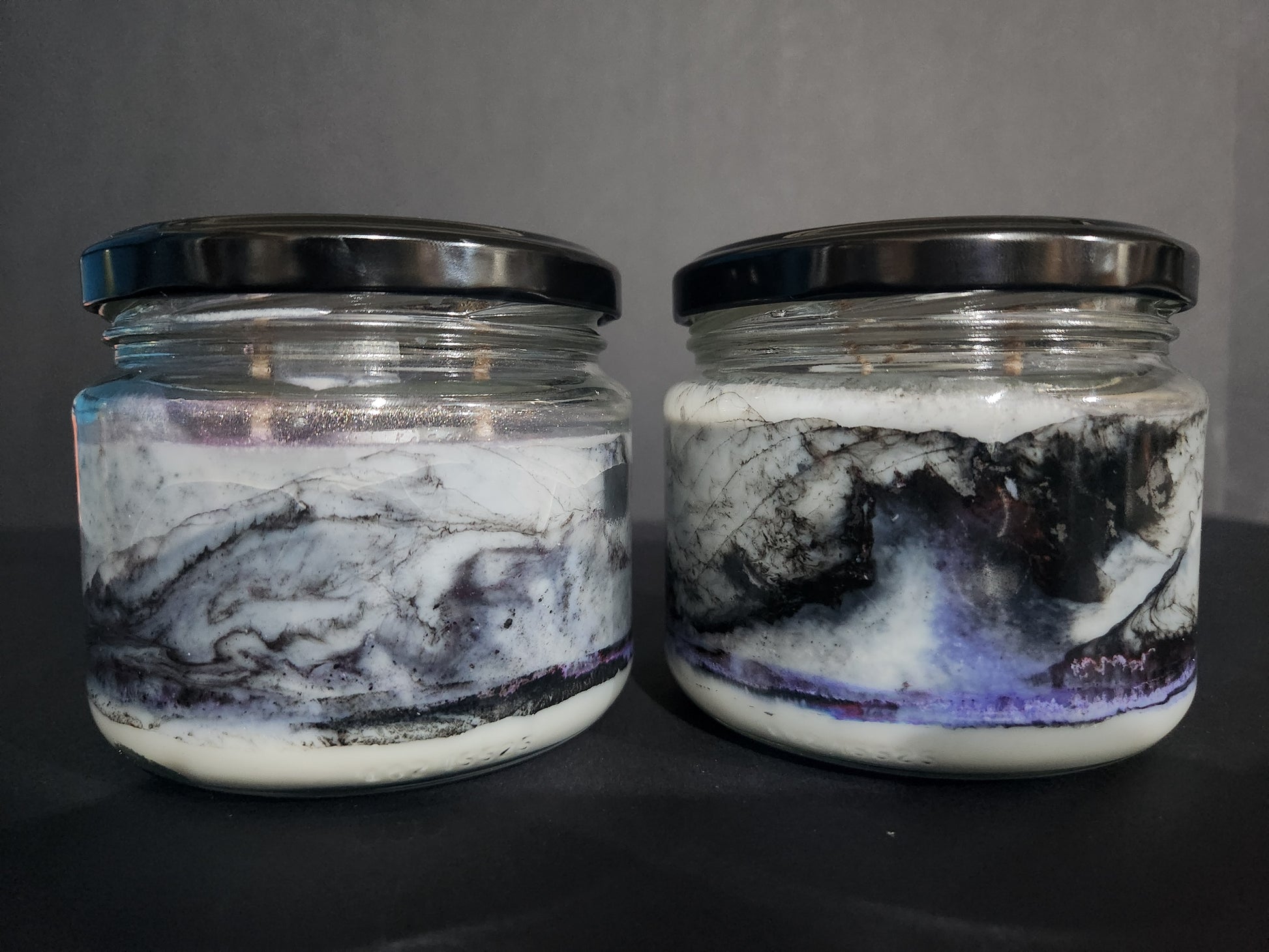 The Candle Shelf. Handmade Custom Bookish Soy Wax Candles inspired by those unforgettable moments between the pages. Beautifully marbled glass container jar candles. Shadow Daddy, Star Dust, The Last Page. Pillar candles. Book candle. Heats candle. Forest, floral and leaves candle. Their fancy and deliciously scented. The perfect decor item for your home, office, wedding or even as a gift. We offer customised labels and candle colours. Each candle is made to order.  All candles are made from NZ sourced wax.