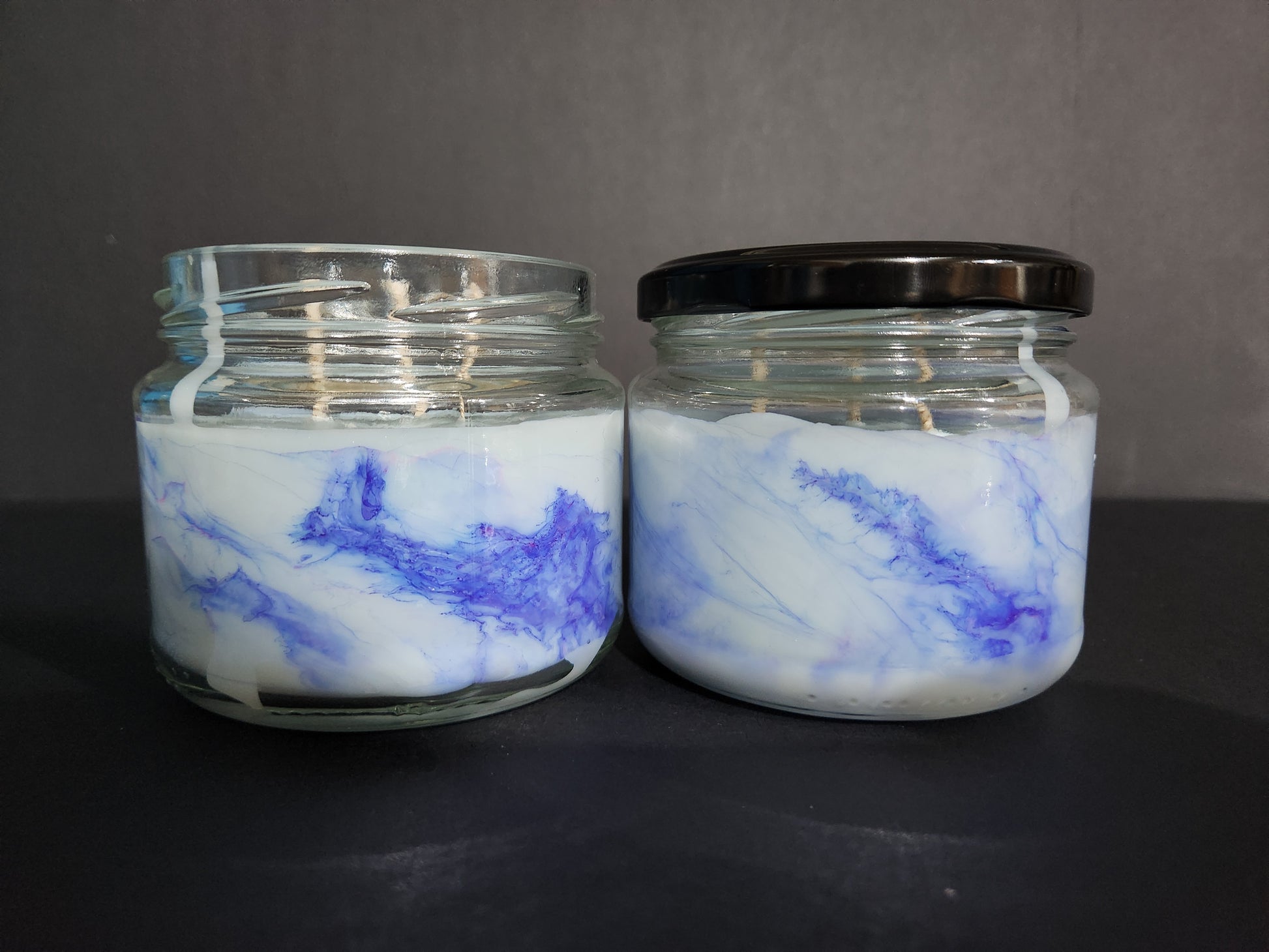 The Candle Shelf. Handmade Custom Bookish Soy Wax Candles inspired by those unforgettable moments between the pages. Beautifully marbled glass container jar candles. Shadow Daddy, Star Dust, The Last Page. Pillar candles. Book candle. Heats candle. Forest, floral and leaves candle. Their fancy and deliciously scented. The perfect decor item for your home, office, wedding or even as a gift. We offer customised labels and candle colours. Each candle is made to order.  All candles are made from NZ sourced wax.